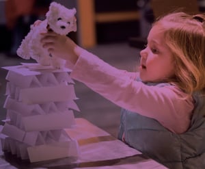 Young girl engineer doing a Tower Power challenge