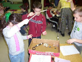 Kids exploring the properties of magnets